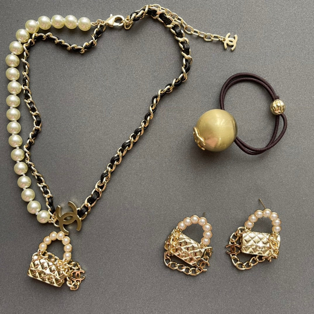 Mini Bag & Pearl Chain Necklace – Statement Design