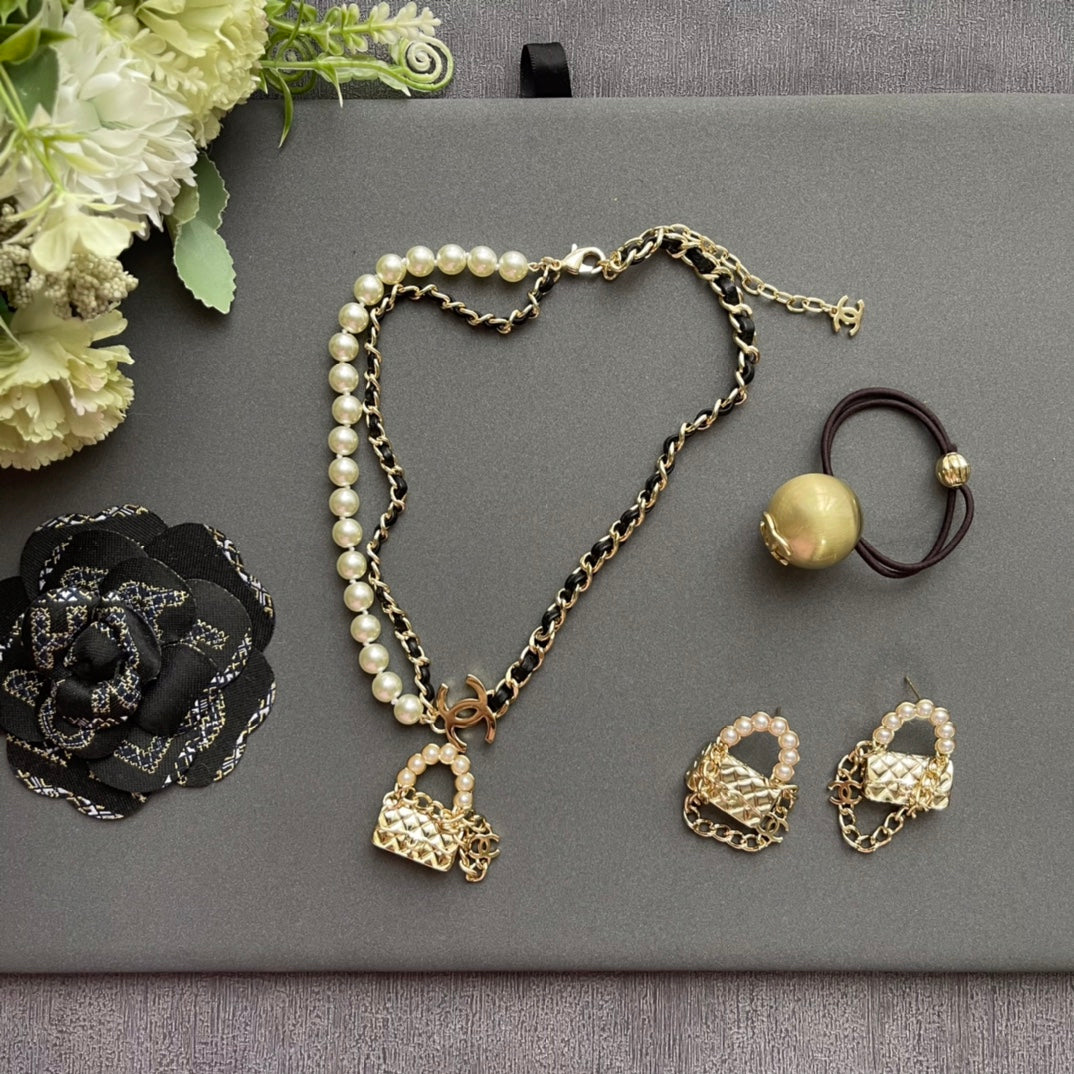Mini Bag & Pearl Chain Necklace – Statement Design