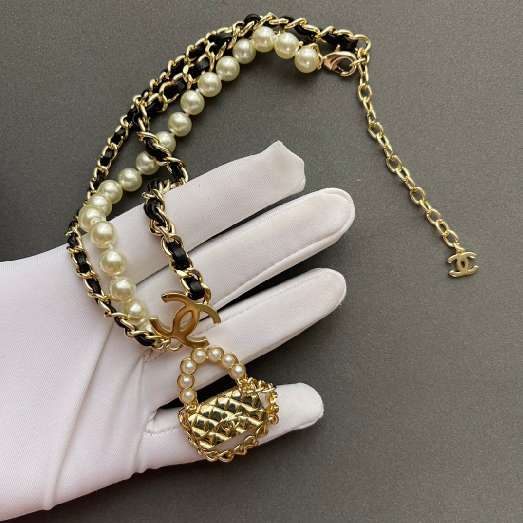 Mini Bag & Pearl Chain Necklace – Statement Design