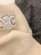 Arc de Triomphe V-Neck Fuzzy Sleeve Sweater