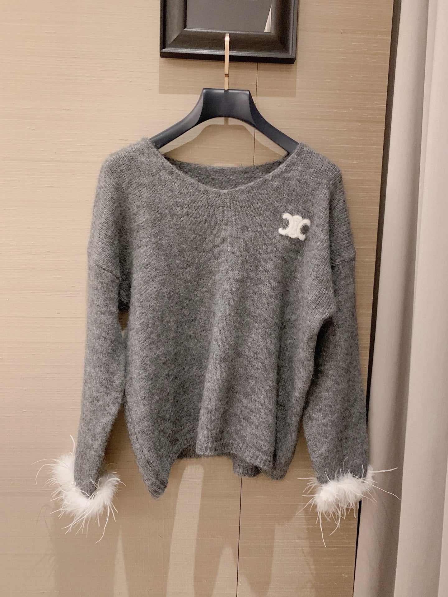 Arc de Triomphe V-Neck Fuzzy Sleeve Sweater