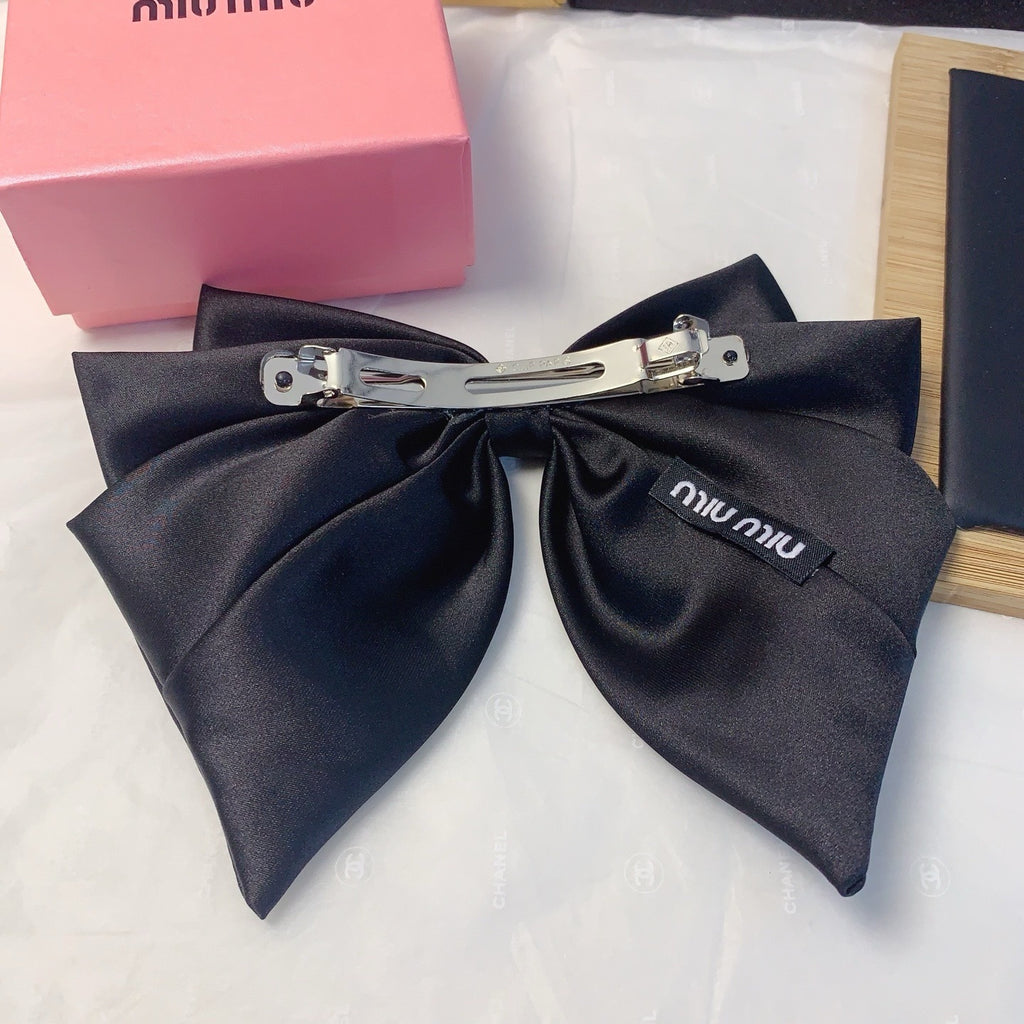 Satin Logo Bow Hair Clip — Elegant & Versatile