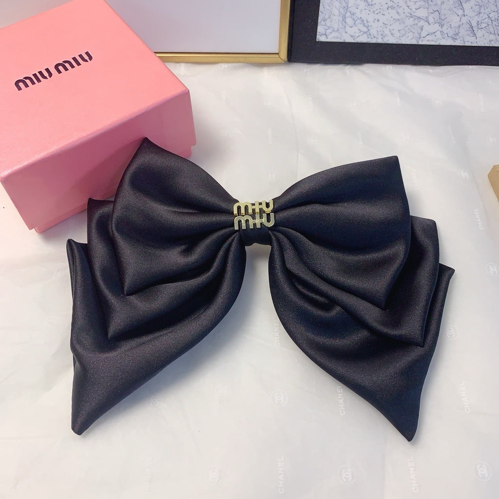 Satin Logo Bow Hair Clip — Elegant & Versatile