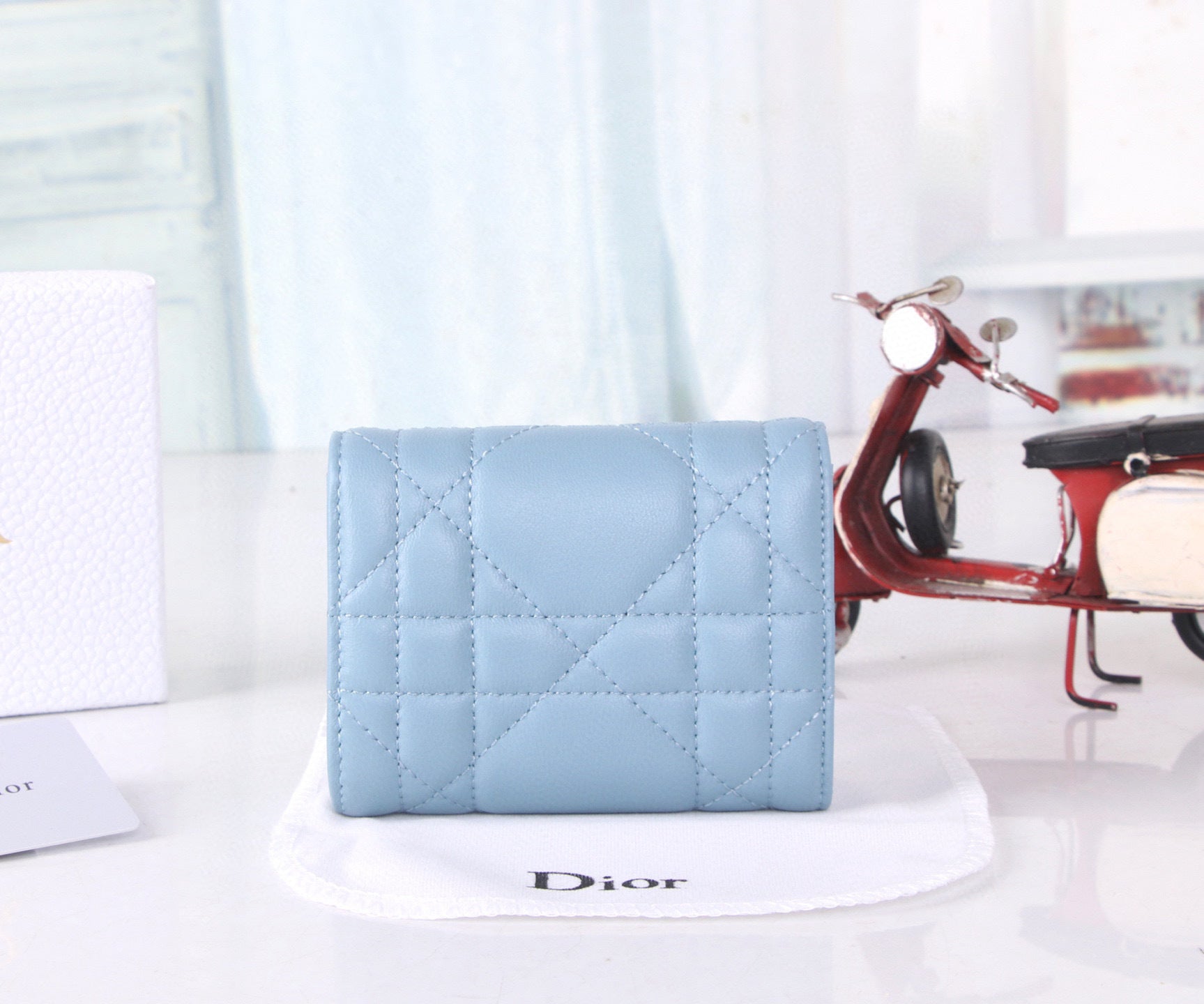 Premium Lambskin Compact Wallet with Crystal Hardware – New Season Collection