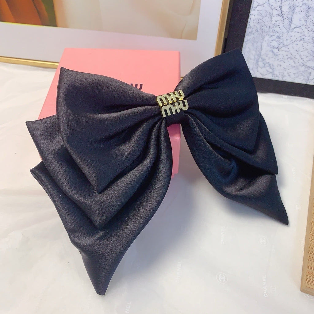 Satin Logo Bow Hair Clip — Elegant & Versatile