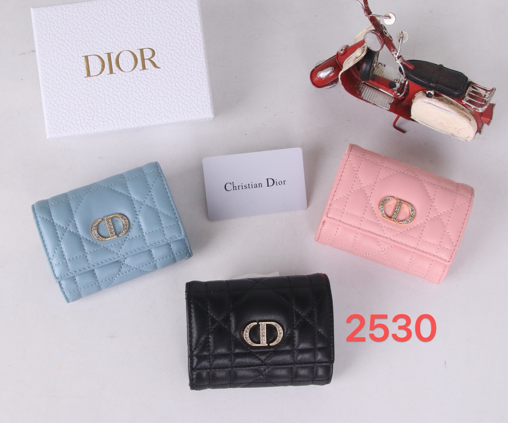 Premium Lambskin Compact Wallet with Crystal Hardware – New Season Collection